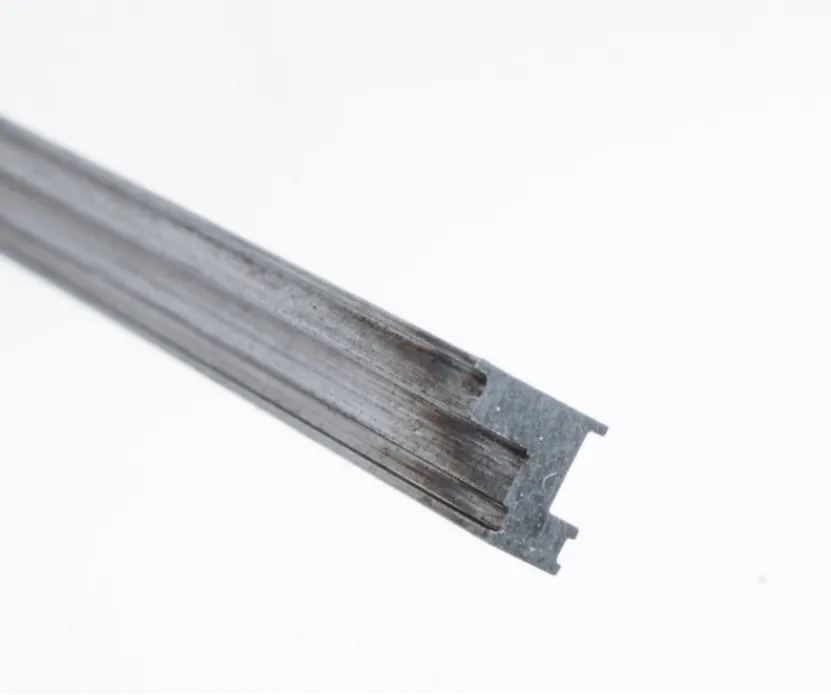 Grooved metal profile cross-section